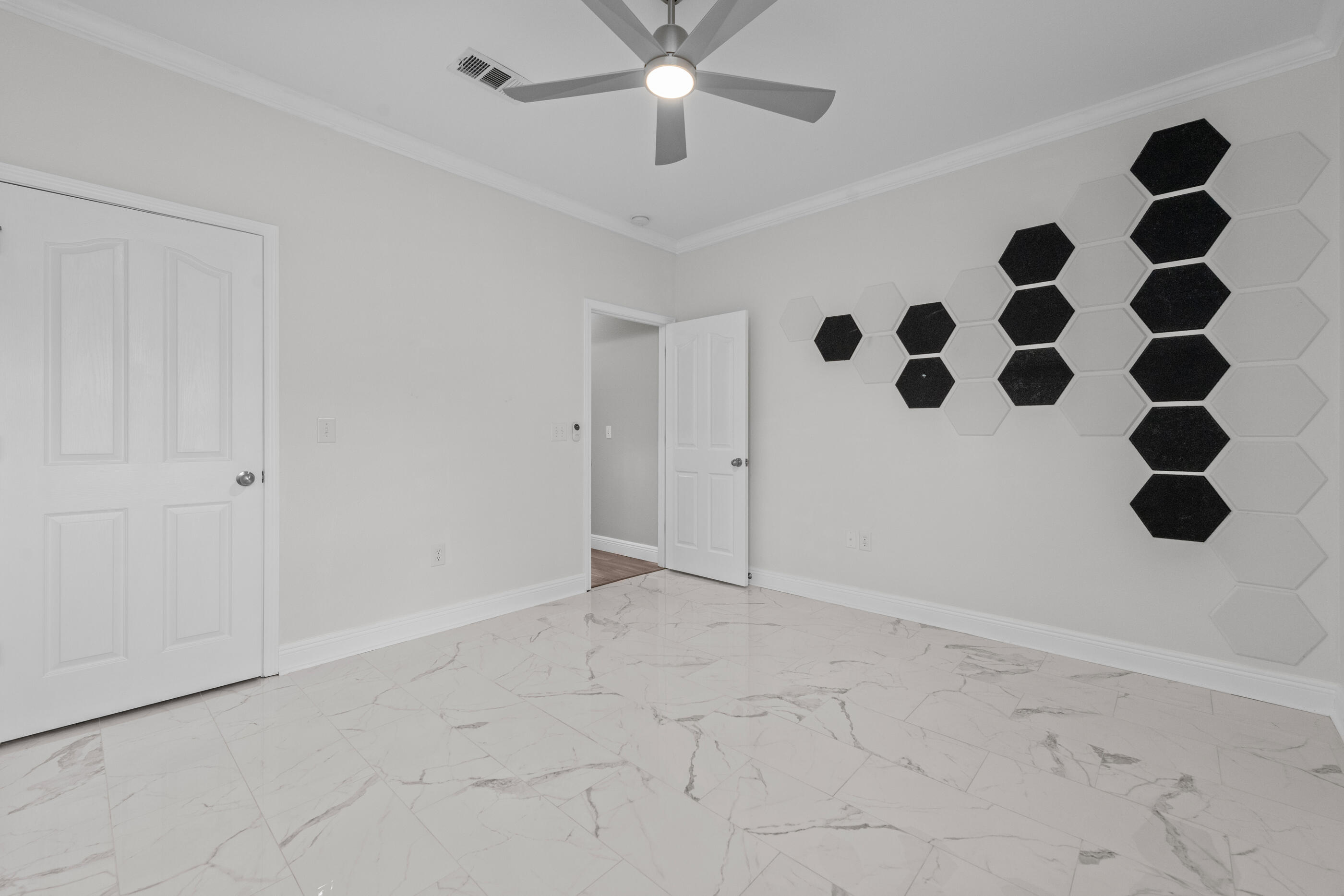 760 Lime Lane Crestview, FL 32536 - Photo 33 of 46 a view of an empty room with window and chandelier fan