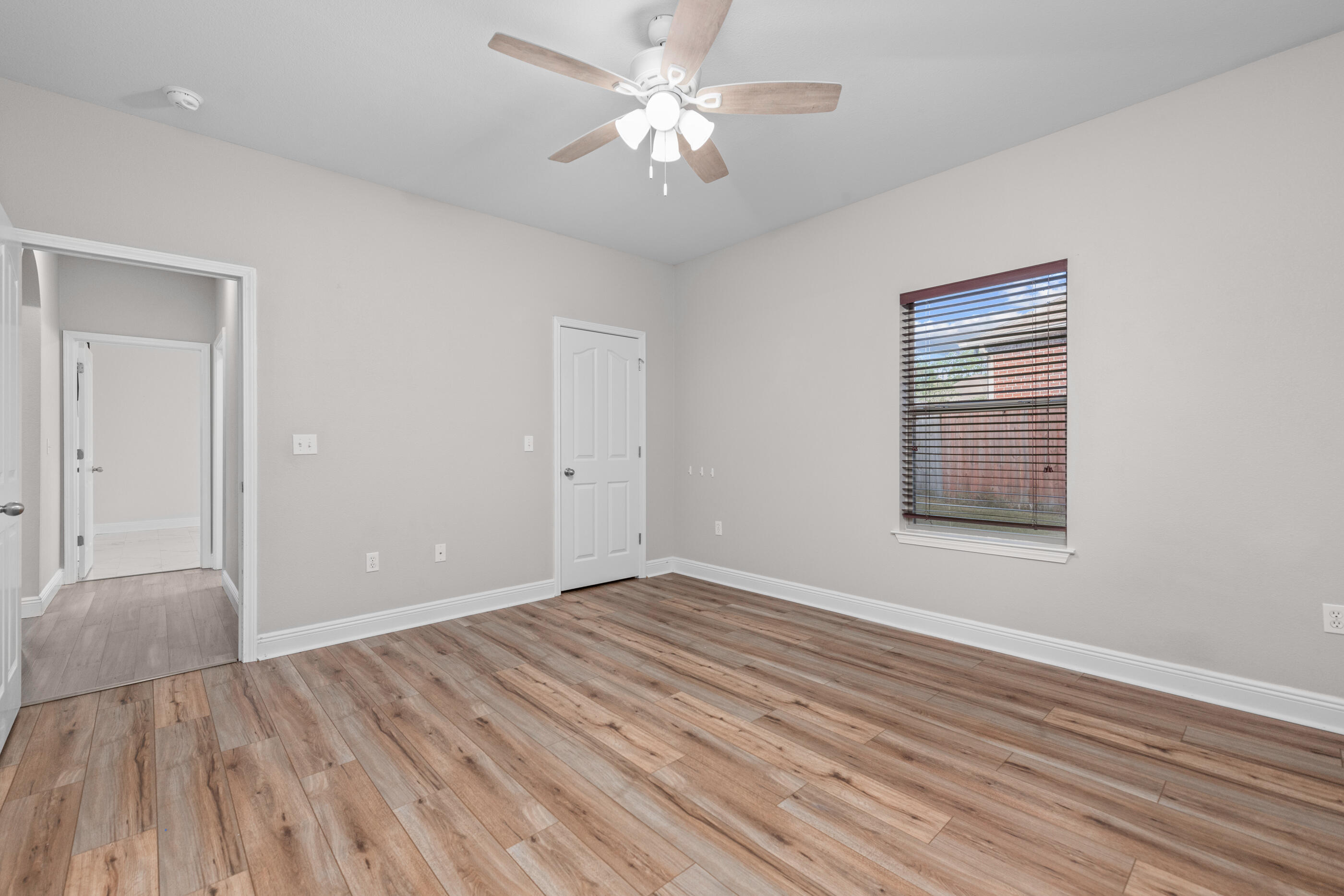 760 Lime Lane Crestview, FL 32536 - Photo 38 of 46 a view of room window and wooden floor