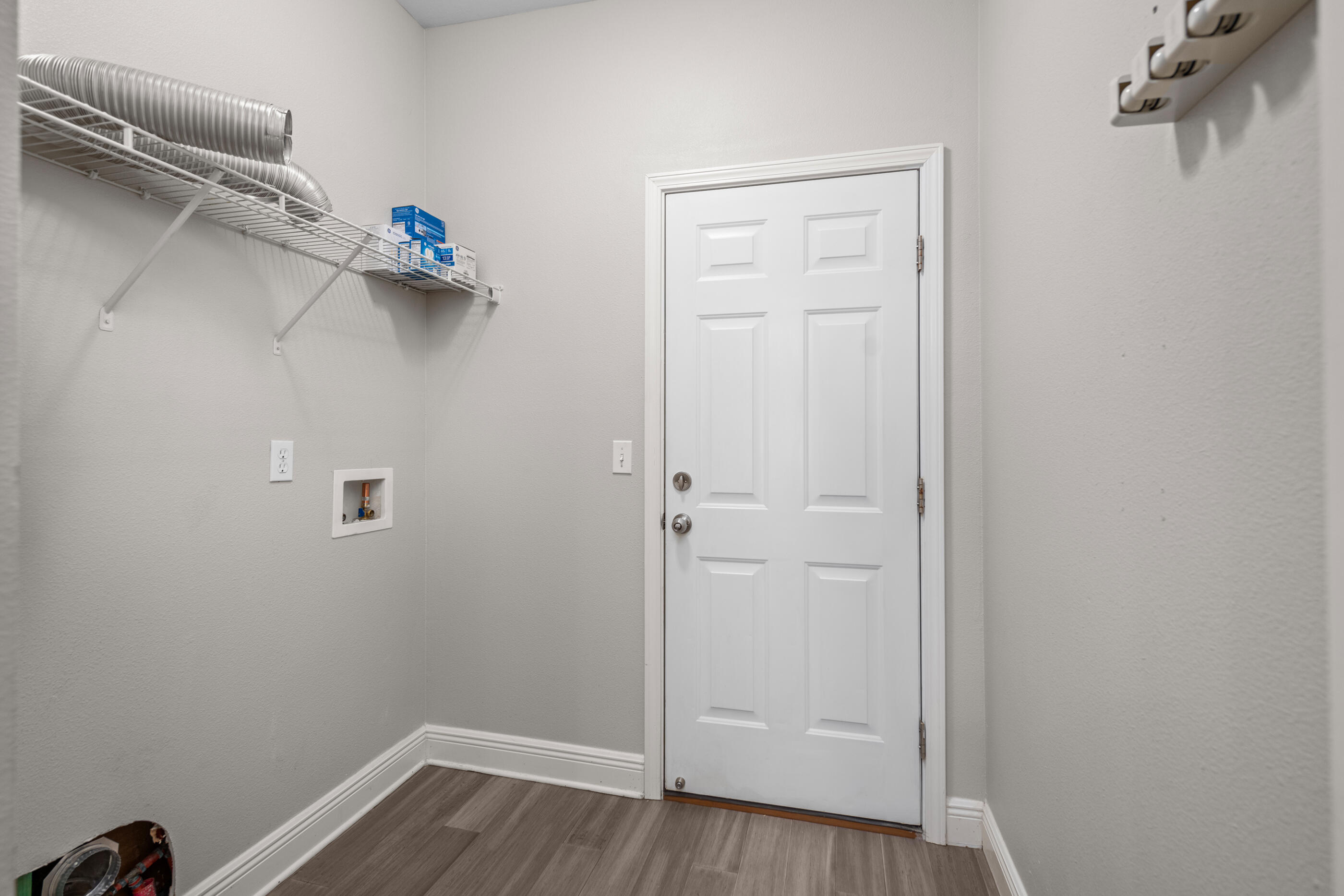 760 Lime Lane Crestview, FL 32536 - Photo 40 of 46 a view of a room with wooden floor
