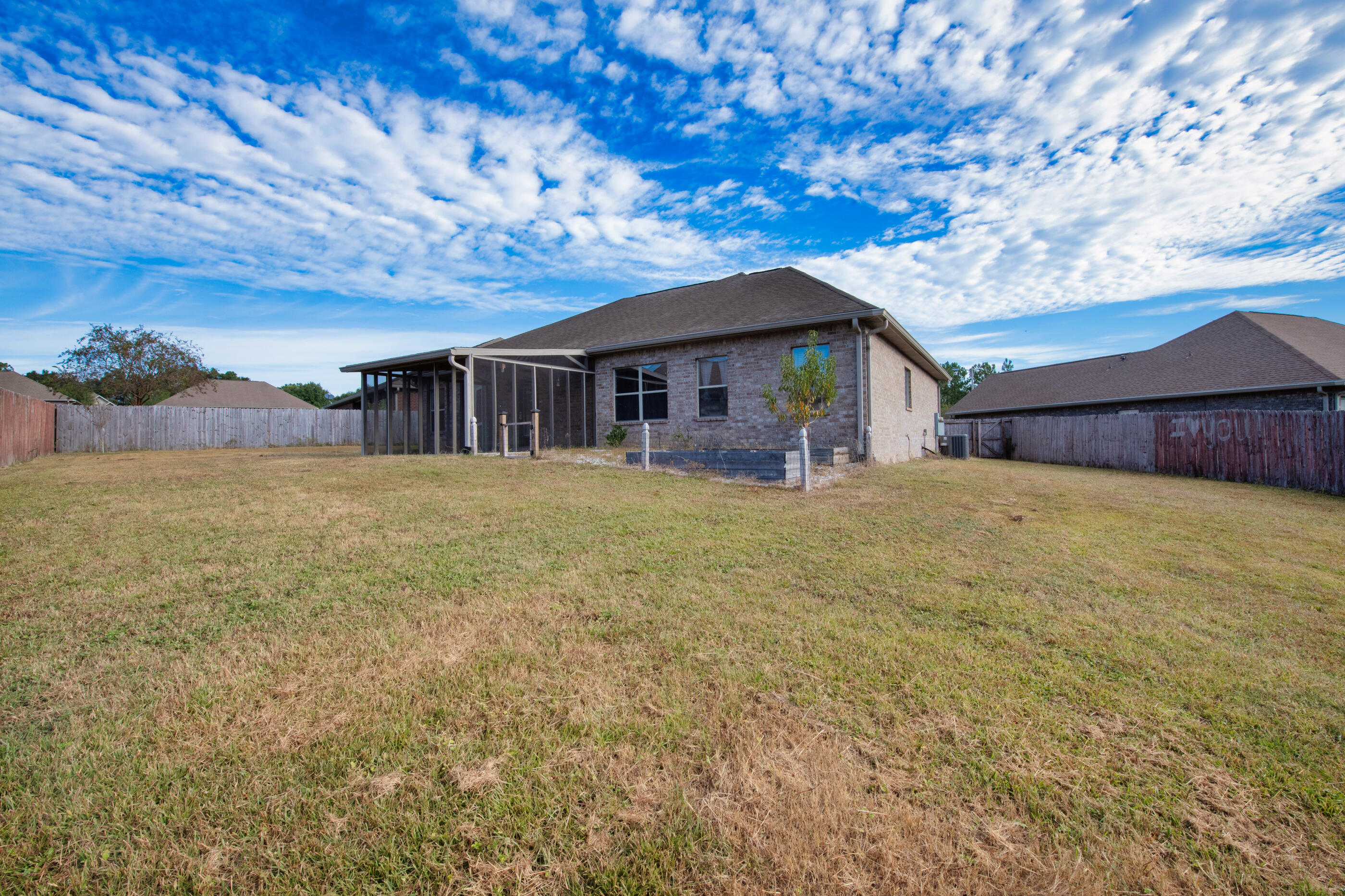 760 Lime Lane Crestview, FL 32536 - Photo 45 of 46 a view of a house with a yard
