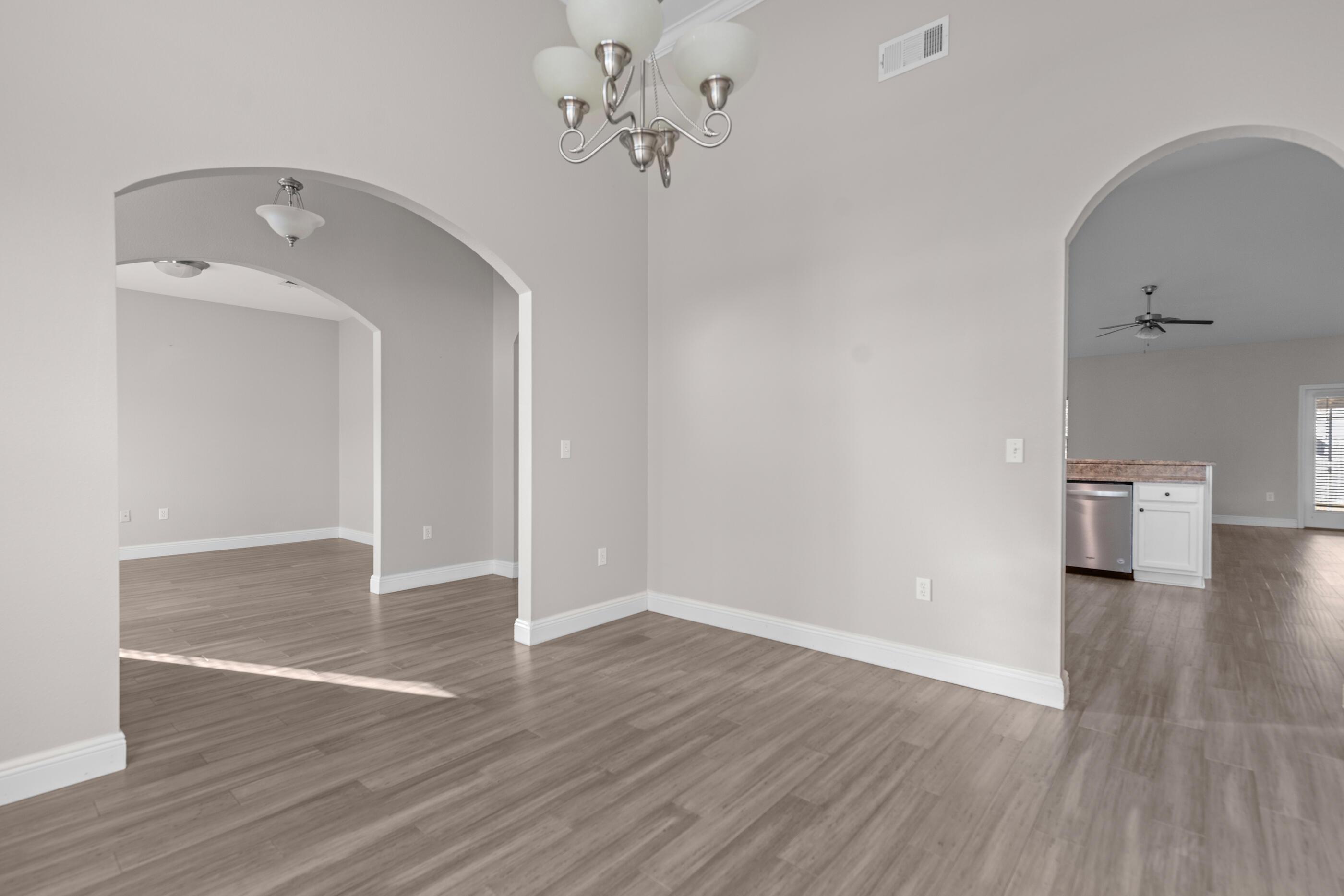 760 Lime Lane Crestview, FL 32536 - Photo 6 of 46 a view of a livingroom with wooden floor