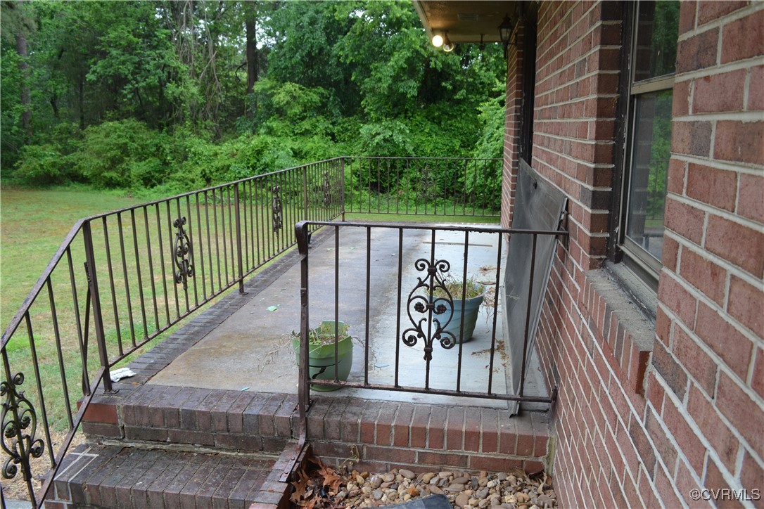 5109 West Hundred Road Chester, VA 23831 - Photo 30 of 34 a view of balcony with wooden floor and fence