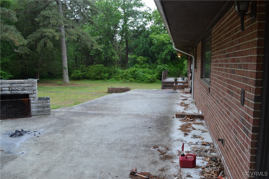 5109 West Hundred Road Chester, VA 23831 - Photo 31 of 34 a view of backyard with outdoor seating and green space