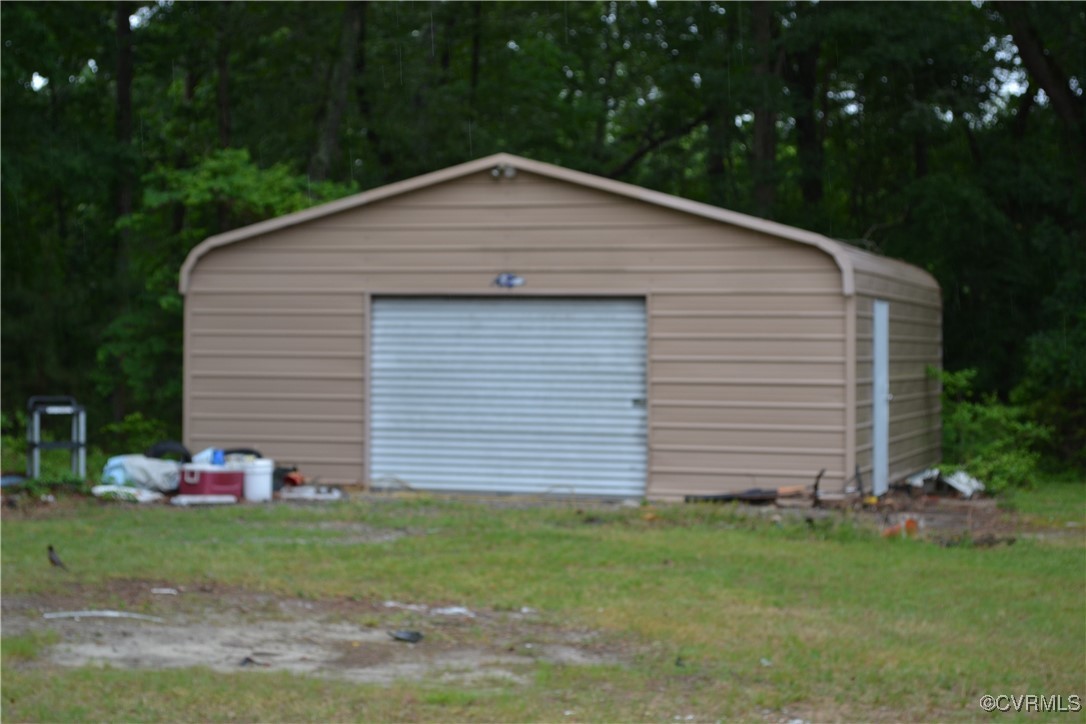 5109 West Hundred Road Chester, VA 23831 - Photo 33 of 34 a front view of a house with a yard