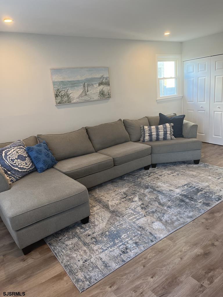 136 44th Street South, Unit A Brigantine, NJ 08203 - Photo 11 of 19 a living room with furniture and a couch