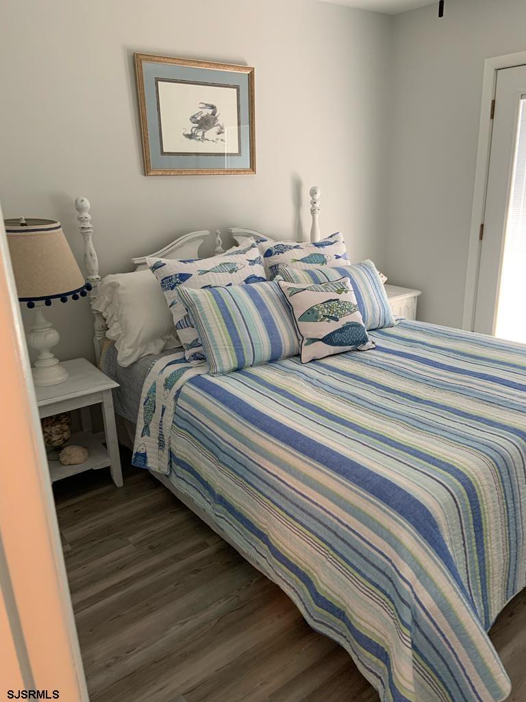 136 44th Street South, Unit A Brigantine, NJ 08203 - Photo 16 of 19 a bedroom with a bed and a window