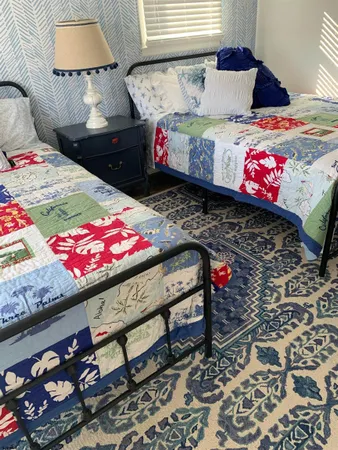 a bed room with a bed and a couch