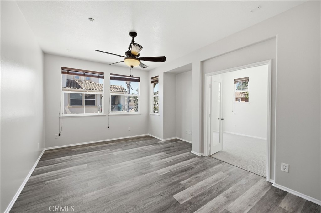 3603 Jetty Carlsbad, CA 92010 - Photo 19 of 43 a view of empty room with wooden floor and fan