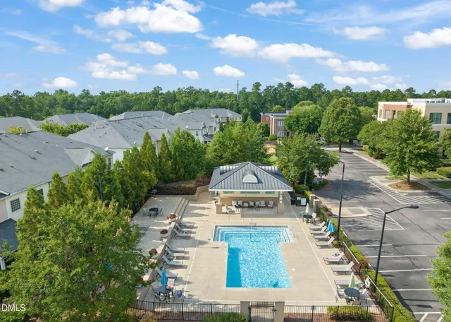 an aerial view of a house with a garden
