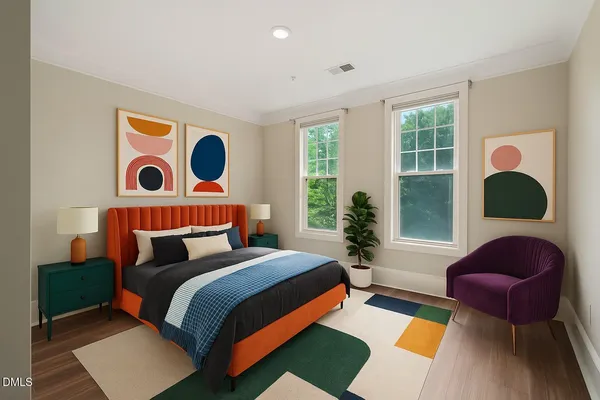 a bedroom with bed and a window