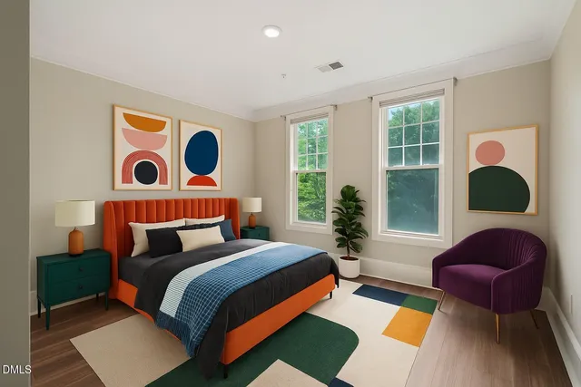 a bedroom with bed and a window