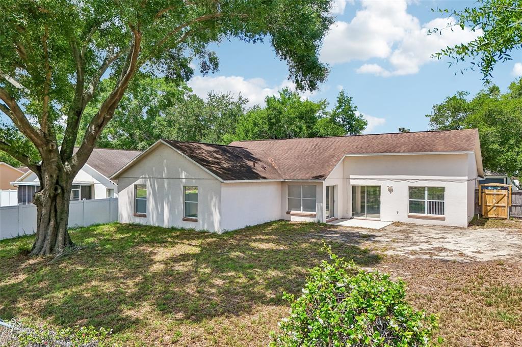 2596 Alclobe Circle Ocoee, FL 34761 - Photo 4 of 70 front view of a house with a yard