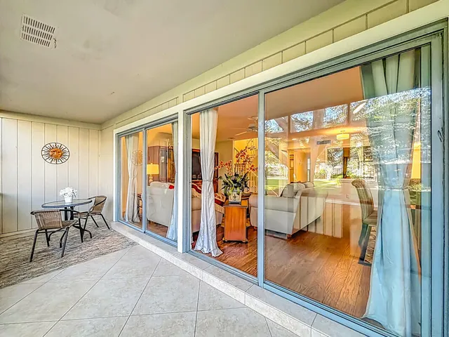 a view of a living room and dining room