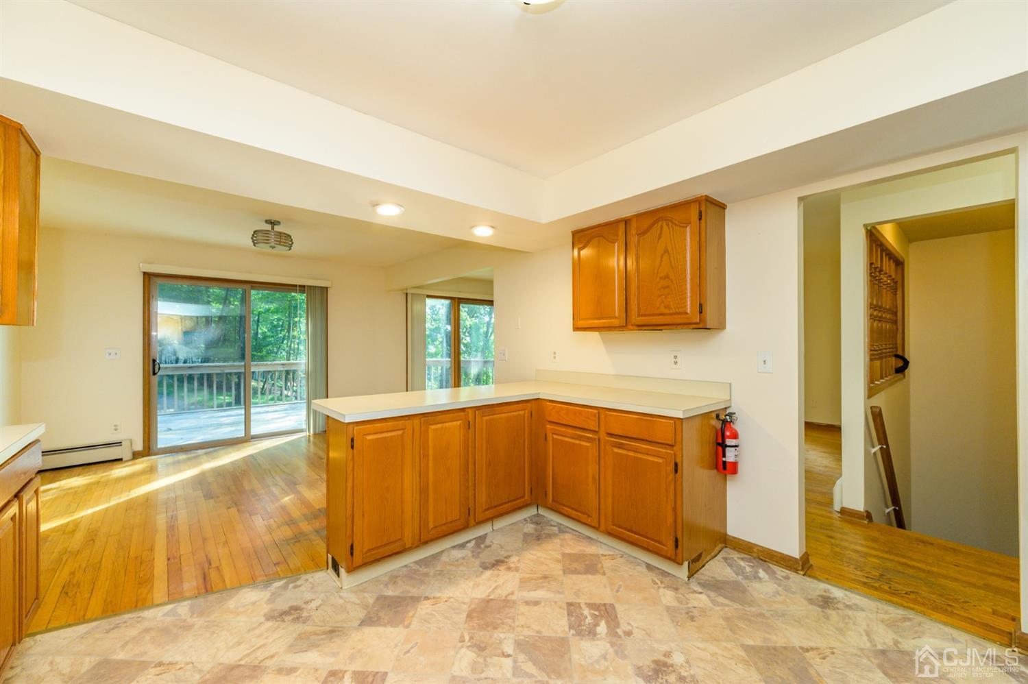 58 Forest Road Andover, NJ 07821 - Photo 15 of 34 a view of a kitchen with a sink and cabinets