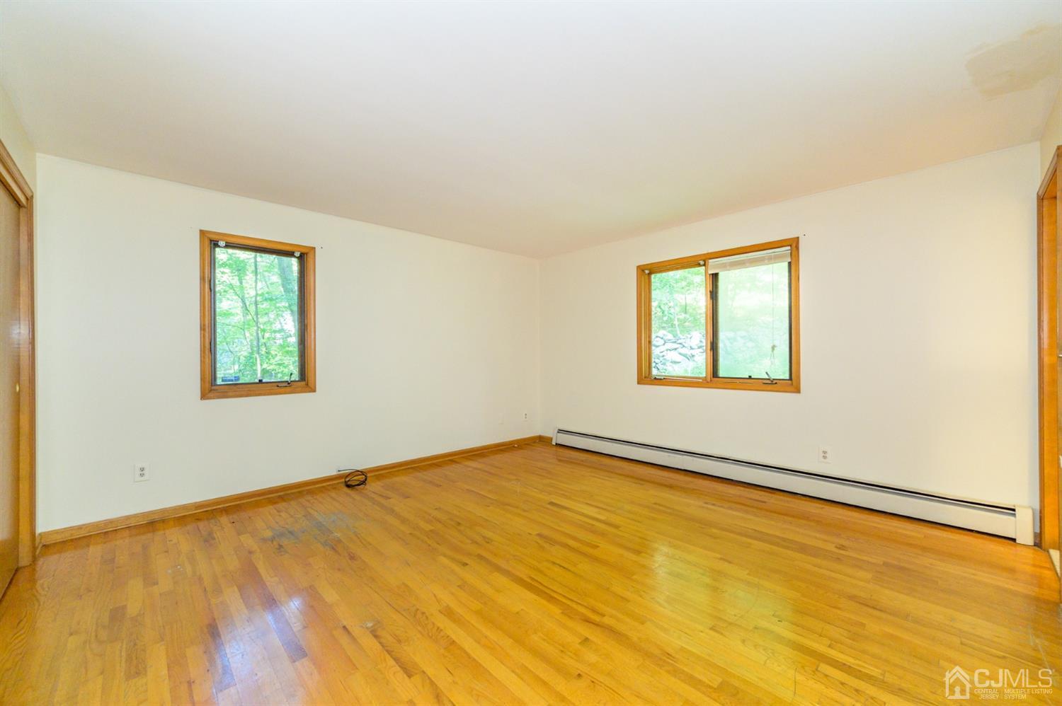 58 Forest Road Andover, NJ 07821 - Photo 17 of 34 a view of an empty room with a window