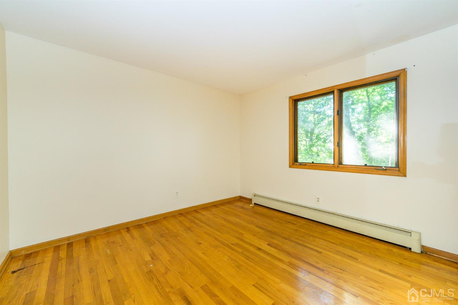 58 Forest Road Andover, NJ 07821 - Photo 22 of 34 a view of an empty room with a window