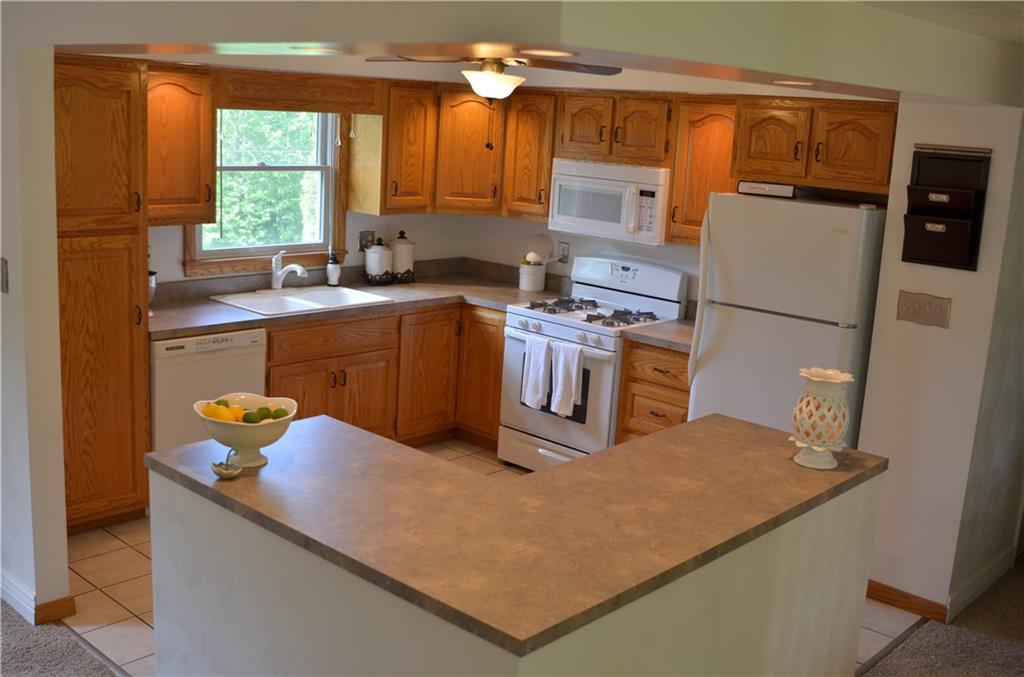 217 Cole Road Sarver, PA 16055 - Photo 4 of 14 Open concept kitchen with appliances and ceramic flooring