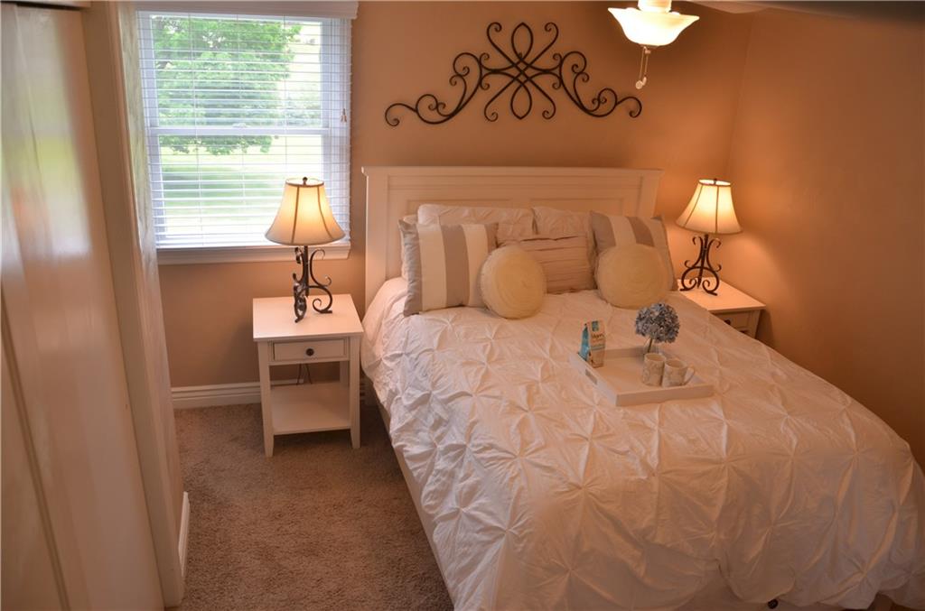 217 Cole Road Sarver, PA 16055 - Photo 6 of 14 Master bedroom with wall-wall carpeting, large closet, ceiling fan and updated bath with walk-in shower