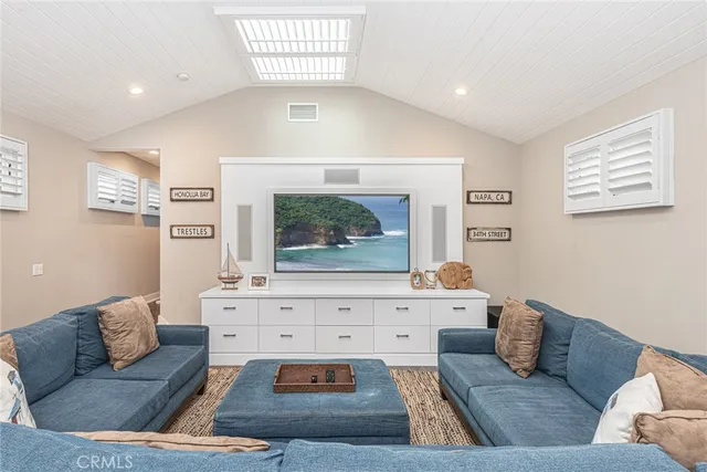 a bedroom with a bed a table and chair