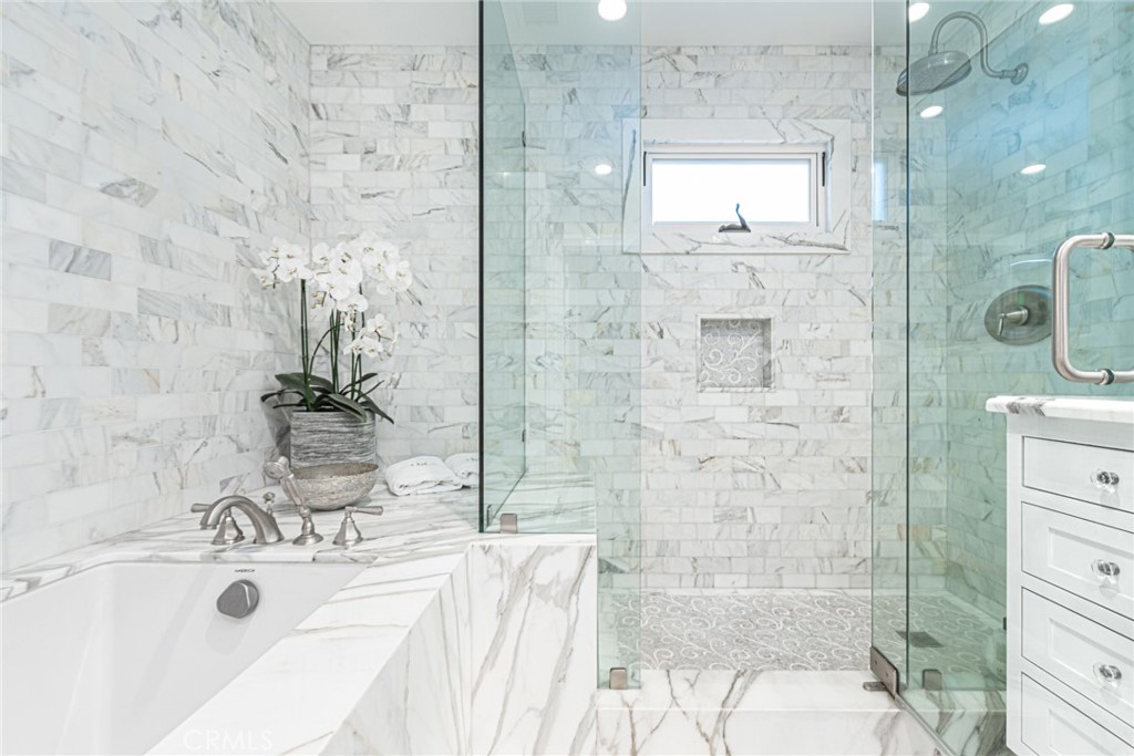 213 34th Street Newport Beach, CA 92663 - Photo 25 of 32 a bathroom with a sink and a shower