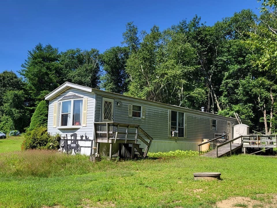 74 Old Turnpike Road Thompson, CT 06262 - Photo 13 of 18 a view of a house with backyard