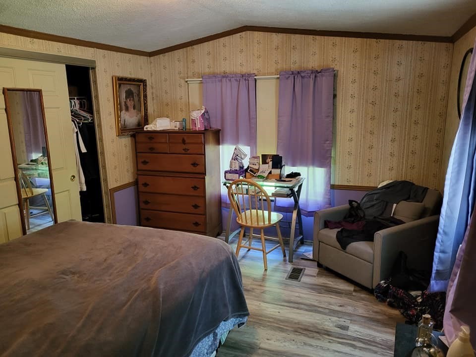 74 Old Turnpike Road Thompson, CT 06262 - Photo 7 of 18 a bed room with a bed and a television