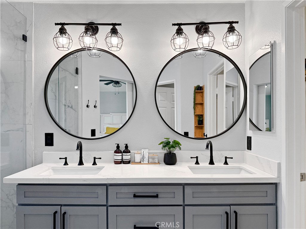 16955 Lake Knoll Parkway Riverside, CA 92503 - Photo 27 of 42 a bathroom with a sink and a mirror