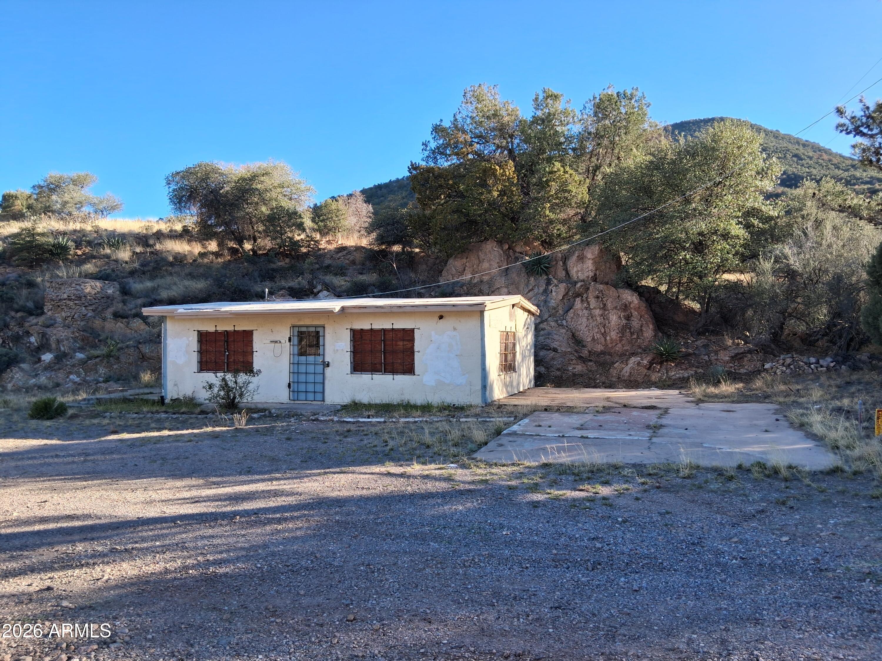 1589 Highway 80 Bisbee, AZ 85603 - Photo 18 of 18 a view of a house with a yard