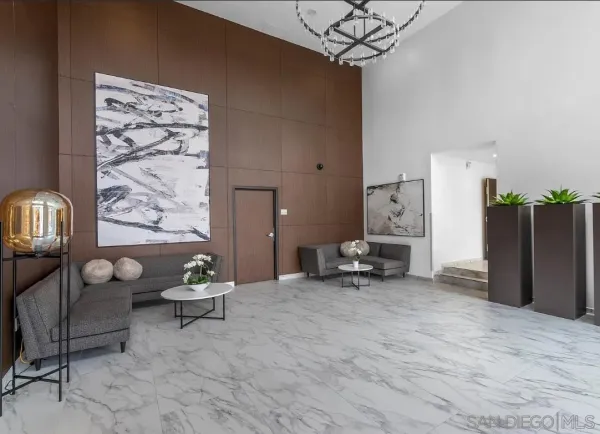 a view of a livingroom with furniture and a window