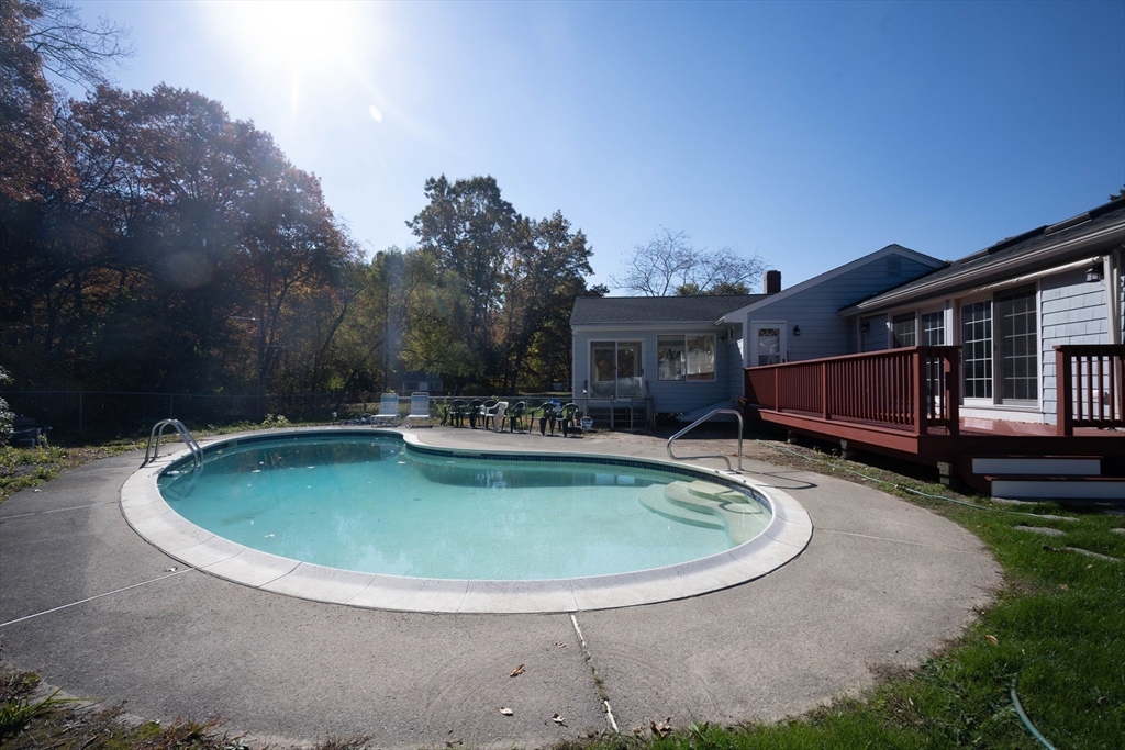 197 Andover Road Billerica, MA 01821 - Photo 31 of 42 a view of a house with swimming pool and sitting area