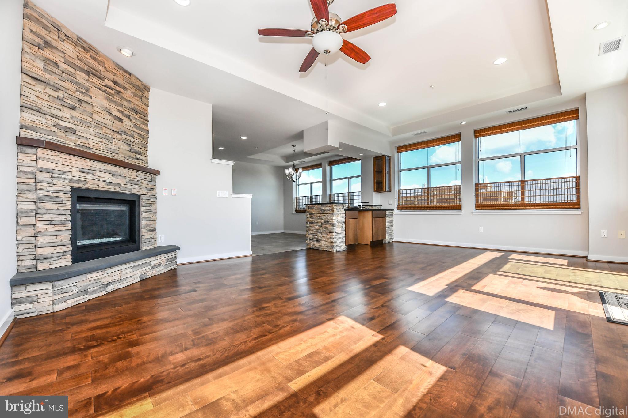 50 Citizen's Way, Unit 604 Frederick, MD 21701 - Photo 5 of 53 Great room , gas fire place & wet bar