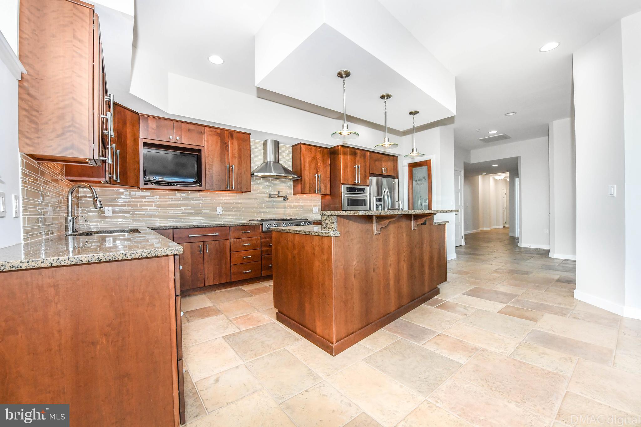 50 Citizen's Way, Unit 604 Frederick, MD 21701 - Photo 8 of 53 Designer kitchen open to breakfast area