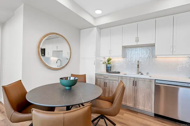 a bedroom with a bed and a mirror