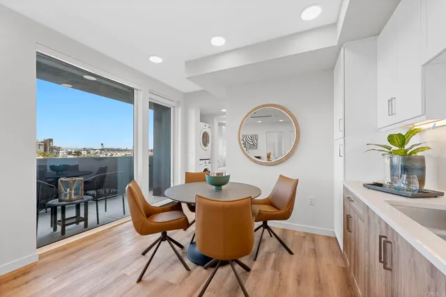a bedroom with a bed and flowerpot
