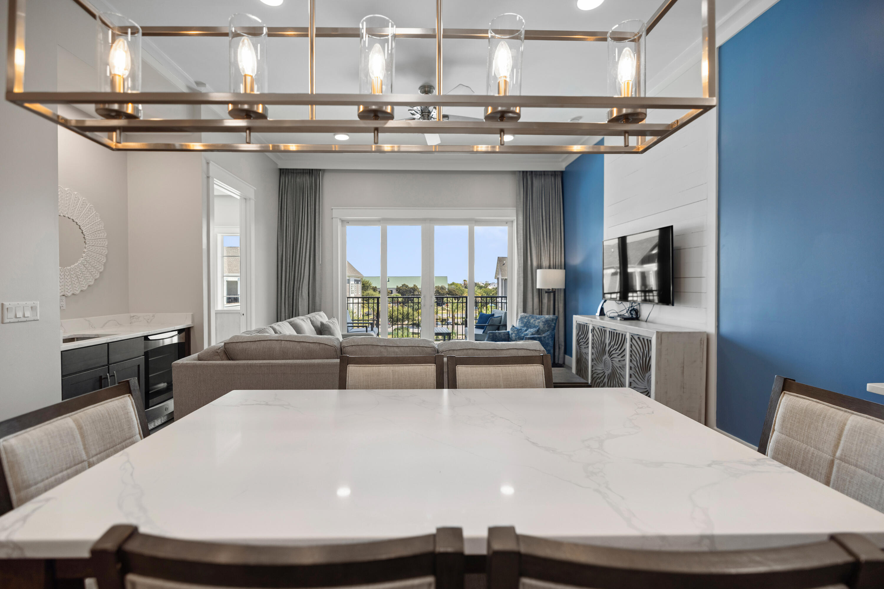 201 Henderson Resort Way, Unit 2202 Destin, FL 32541 - Photo 13 of 48 a living room with a couch and a flat screen tv