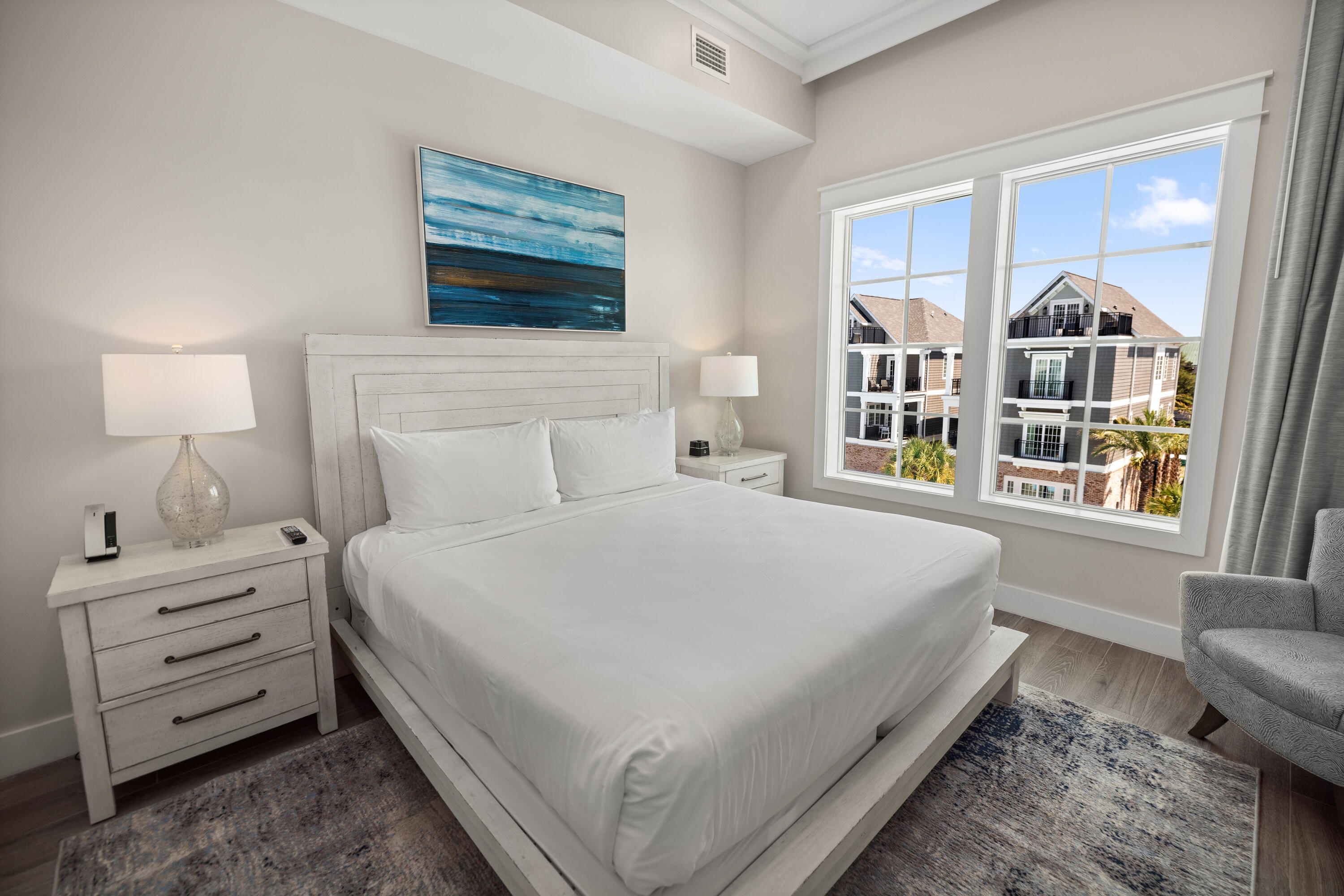 201 Henderson Resort Way, Unit 2202 Destin, FL 32541 - Photo 15 of 48 a bedroom with a bed and a window