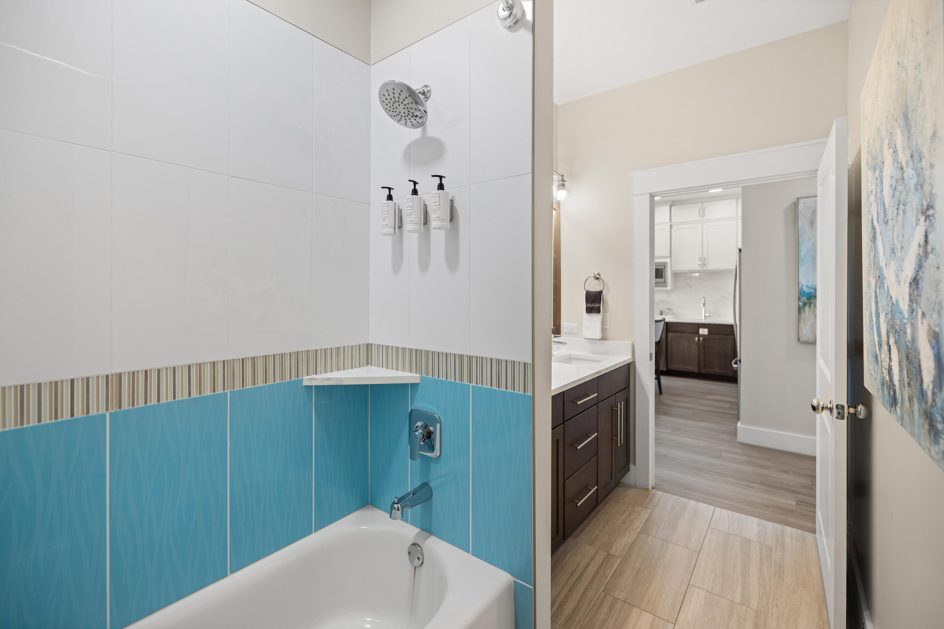 201 Henderson Resort Way, Unit 2202 Destin, FL 32541 - Photo 23 of 48 a bathroom with a sink and a mirror