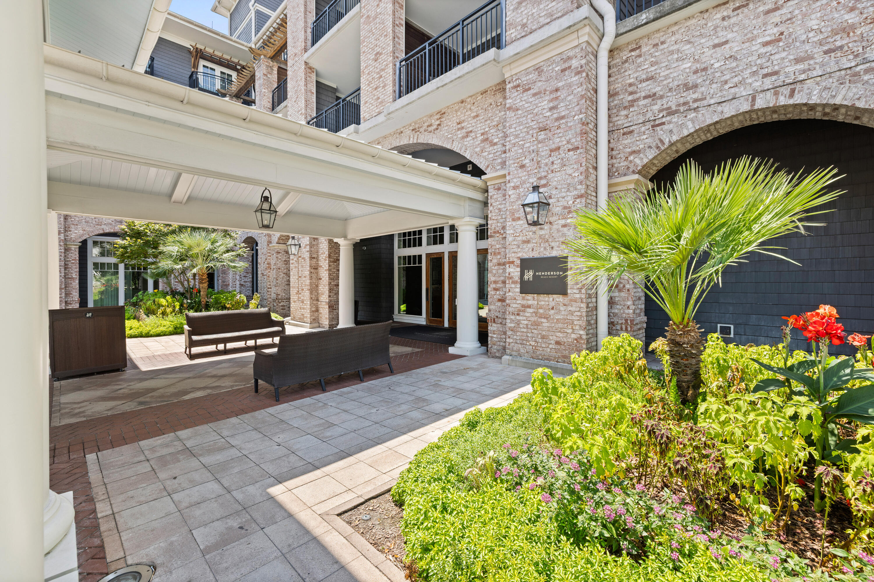 201 Henderson Resort Way, Unit 2202 Destin, FL 32541 - Photo 29 of 48 a front view of a house with a garden