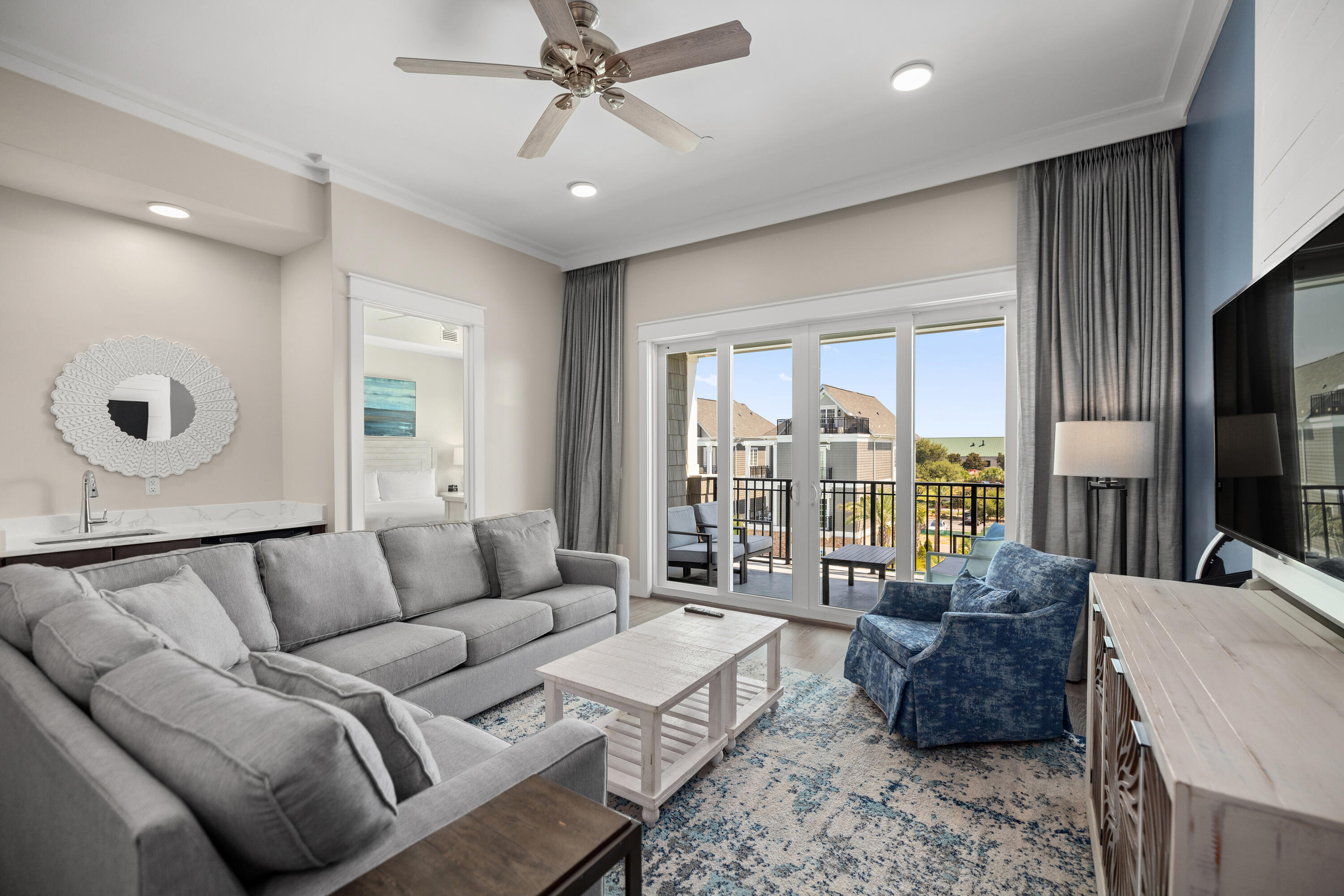 201 Henderson Resort Way, Unit 2202 Destin, FL 32541 - Photo 4 of 48 a living room with furniture and a large window