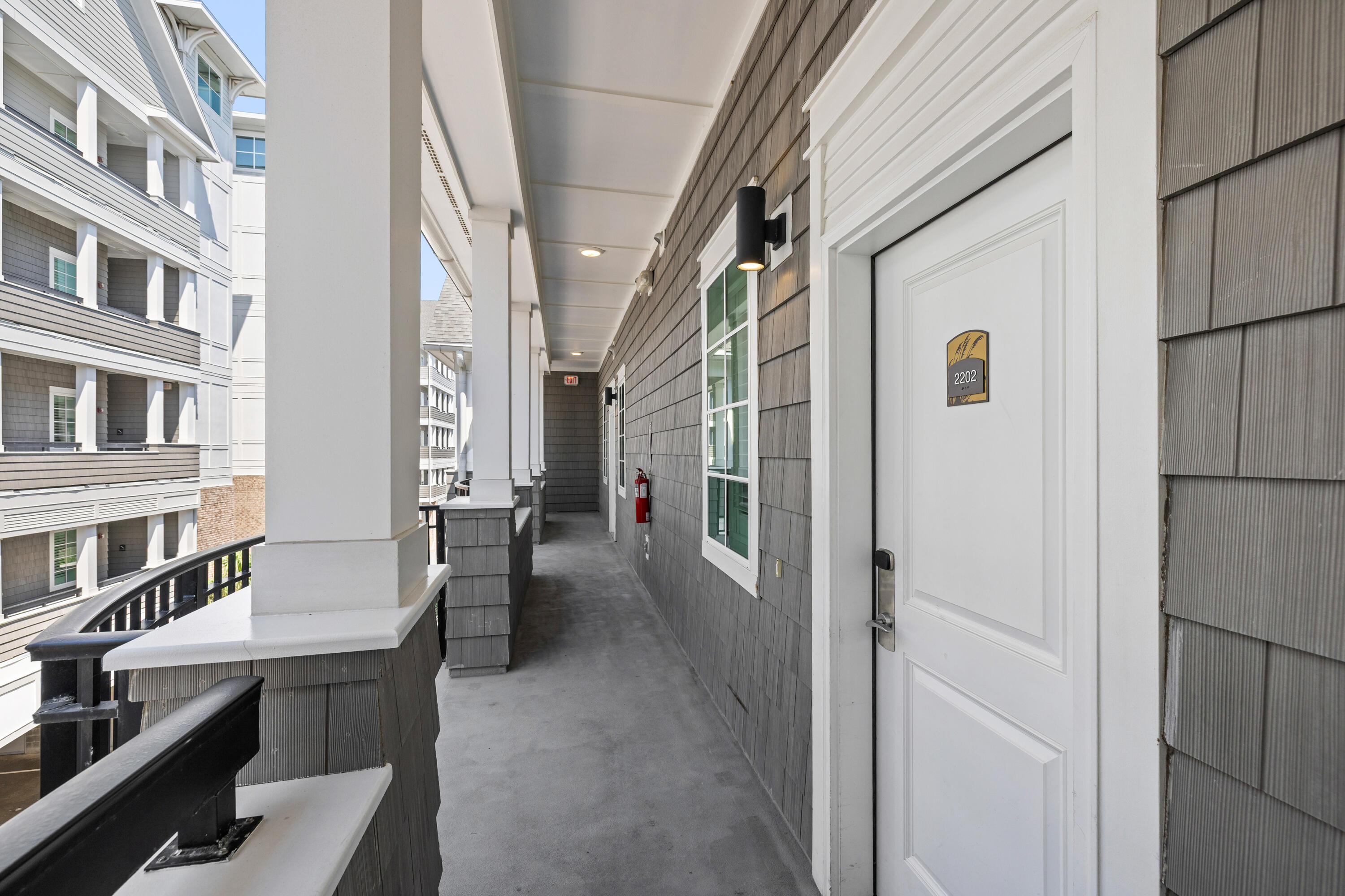 201 Henderson Resort Way, Unit 2202 Destin, FL 32541 - Photo 44 of 48 a view of balcony with furniture and a refrigerator
