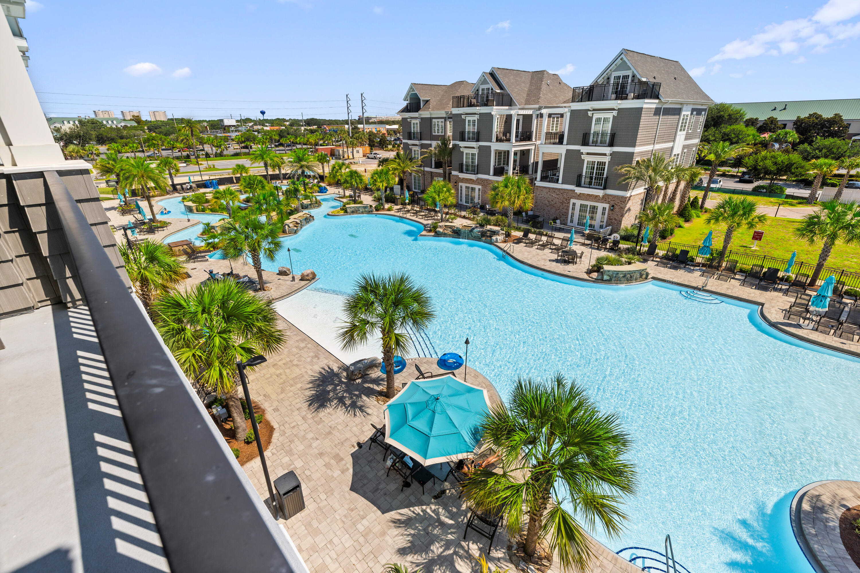 201 Henderson Resort Way, Unit 2202 Destin, FL 32541 - Photo 7 of 48 swimming pool view with plants and large trees