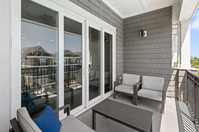 a outdoor living space with furniture and a potted plant