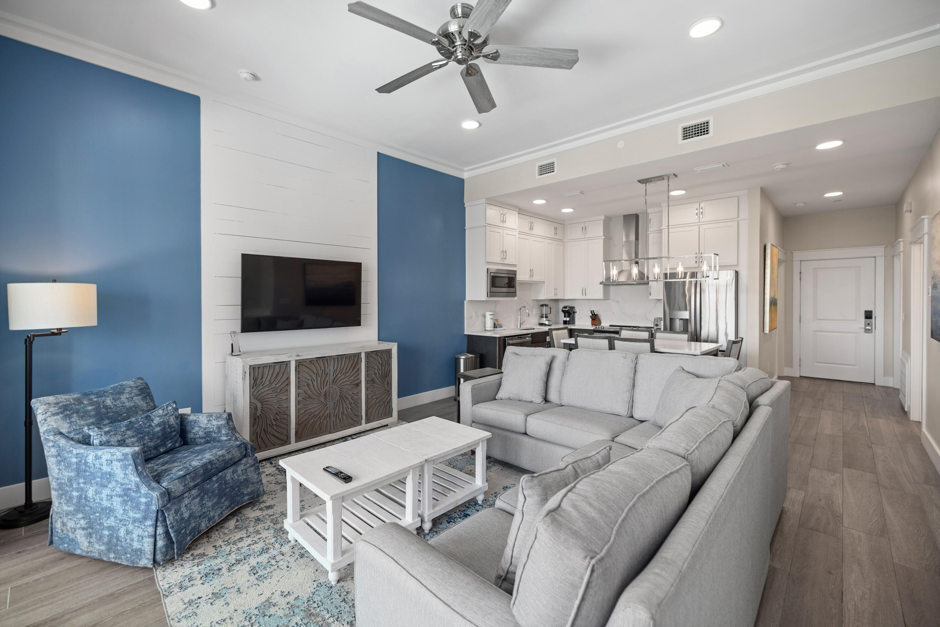 201 Henderson Resort Way, Unit 2202 Destin, FL 32541 - Photo 9 of 48 a living room with furniture and a flat screen tv