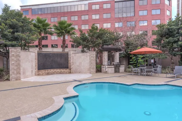 a view of a building with a swimming pool