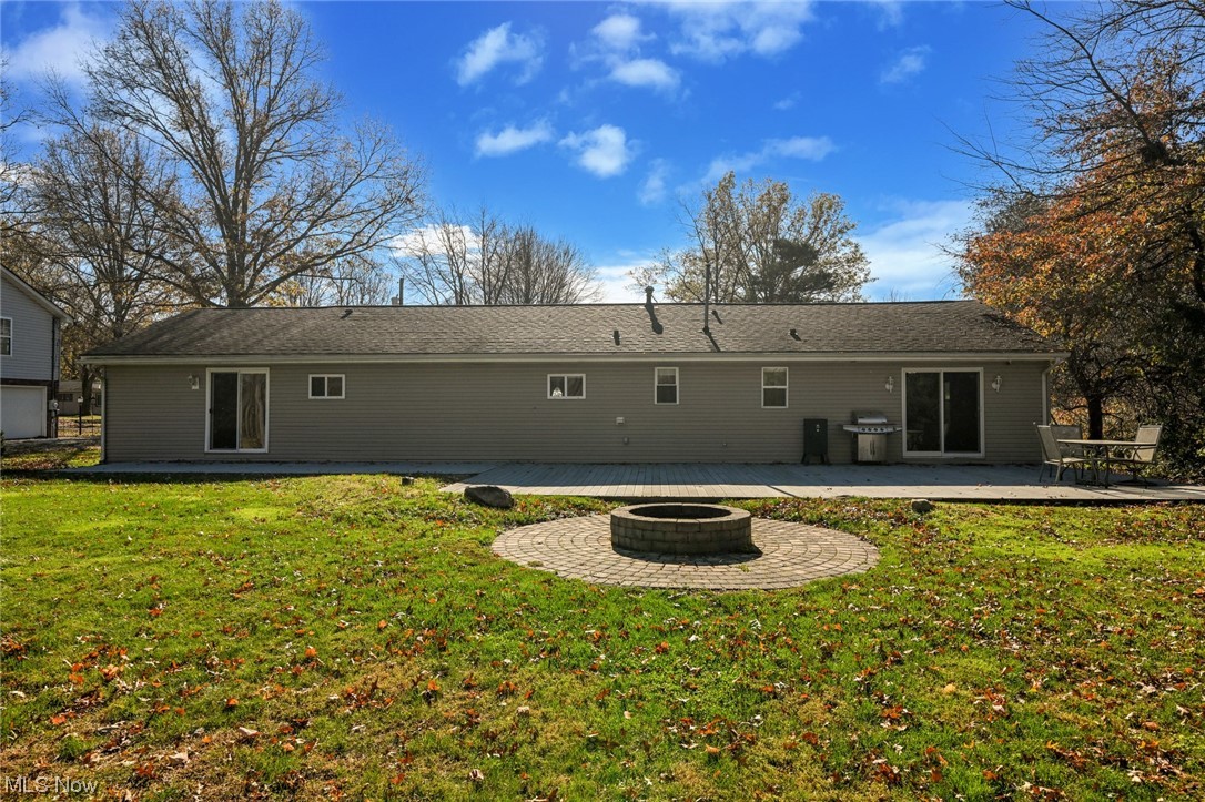 1509 McTaggart Road Stow, OH 44224 - Photo 2 of 30 Rear view of property with an outdoor fire pit, and 40x20 Trex deck