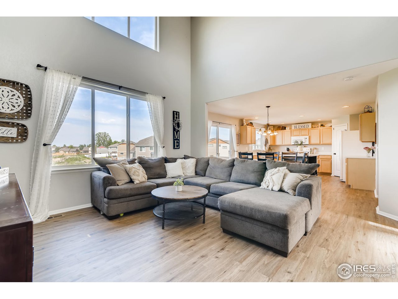 7501 21st Street Greeley, CO 80634 - Photo 9 of 27 a living room with furniture and a large window