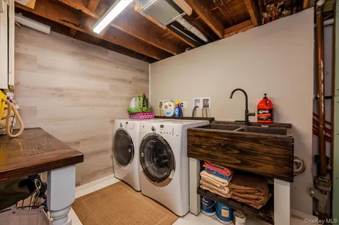 a view of a storage & utility room with racks on the wall