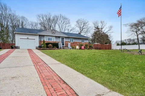 a front view of house with yard