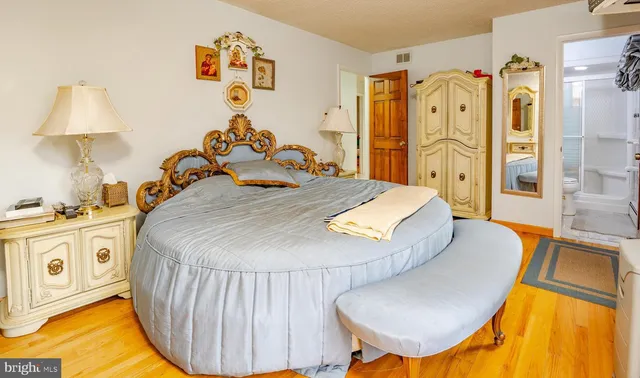 a bed room with a bed and a couch