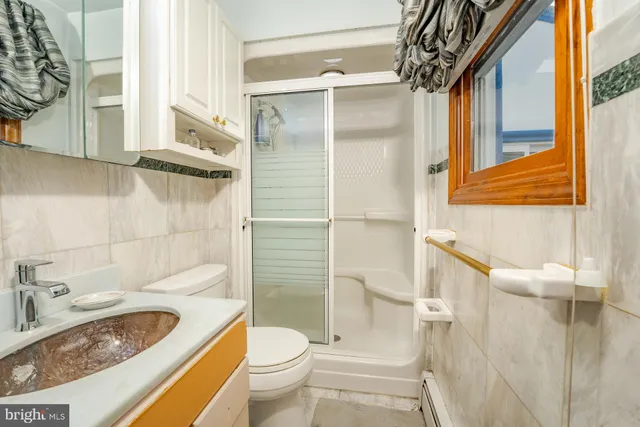 a view of a living room and dining room